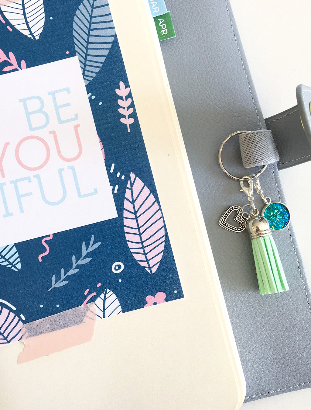 Add a planner charm keyring to your pen loop