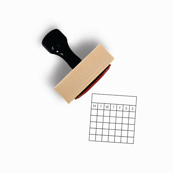 Wooden habit tracker stamp with black handle