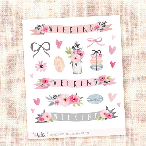 Sheet of pretty watercolour stickers on pale canvas background