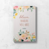 Perimenopause journal showing front cover in pale peach with delicate floral design and the words Bloom Where You Are.