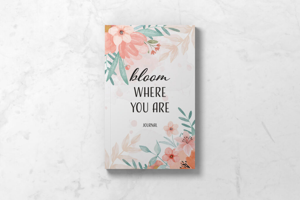 Perimenopause journal showing front cover with delicate floral design and the words Bloom Where You Are.