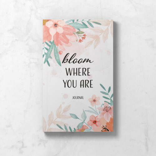 Perimenopause journal showing front cover with delicate floral design and the words Bloom Where You Are.