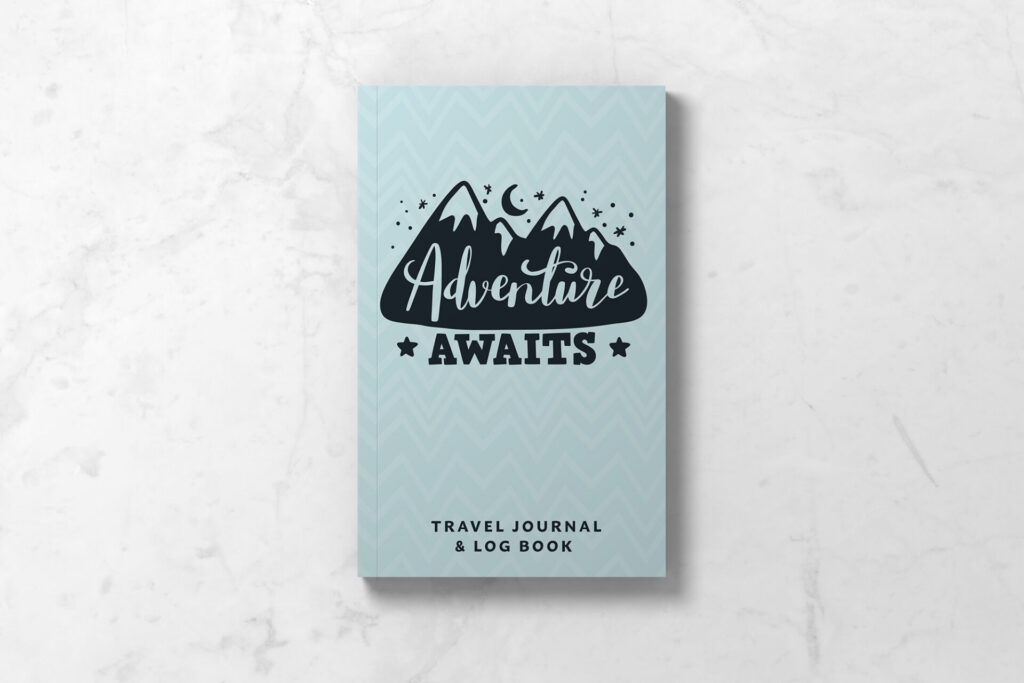 Travel Journal Logbook front cover featuring blue background, simple mountains, and the words Adventure Awaits.