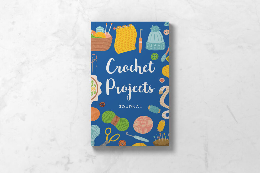 Front cover of Crochet Projects Journal featuring a blue background with various crochet and craft tools around the wording Crochet Projects.
