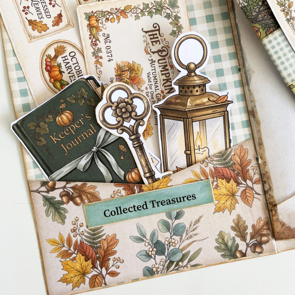 Pumpkin Conservatory junk journal pocket filled with fall ephemera and collected treasures.