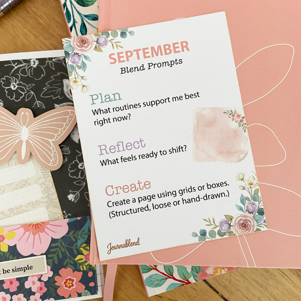 September Blend Prompts card, with floral details and 3 prompts for planning, reflection and creativity. on top of a stack of journals.