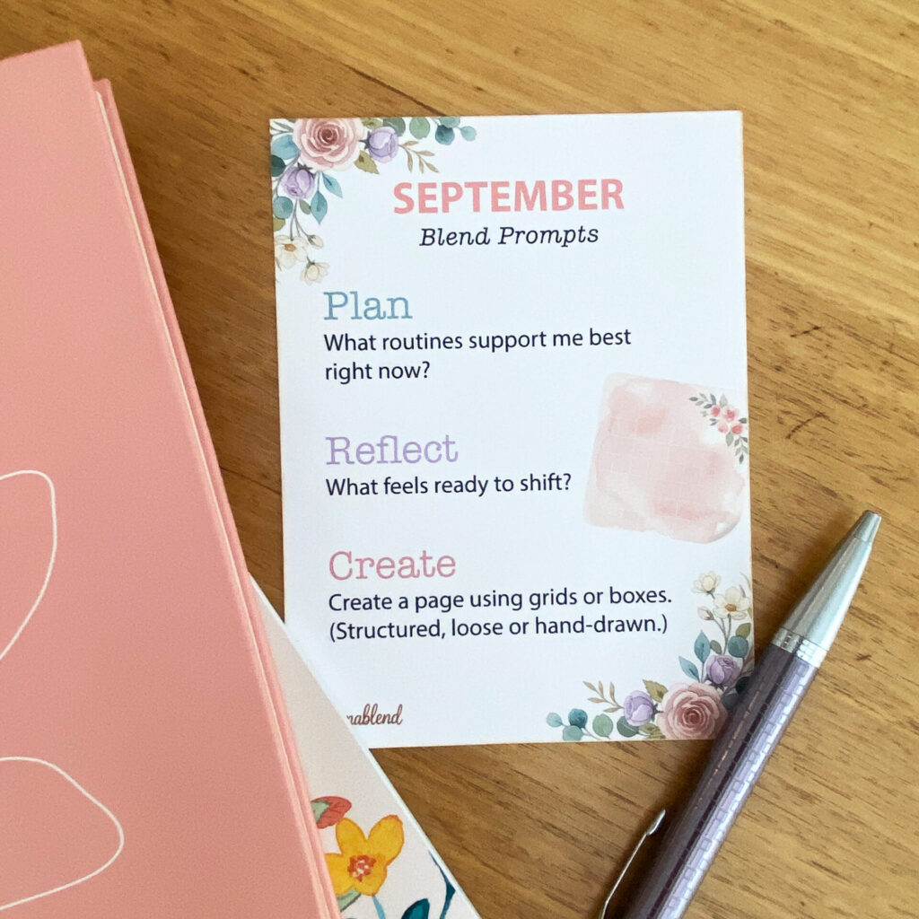 Printable September Blend Prompts card, with 3 prompts to Plan, Reflect and Create. The card has floral details and is next to some journals and a pen.