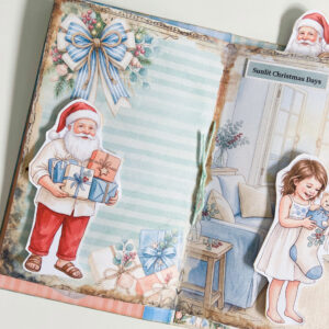 Coasta Christmas junk journal with Santa fussy cut holding presents and a little girl with a Christmas stocking